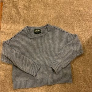 Women’s blue sweater barley worn and in good condition.
